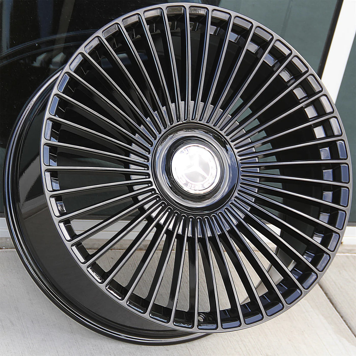 Gloss black 22-inch OE Style Wheels with multiple spokes for Mercedes CLS, S, GLE, GLS SUV and sedan models.