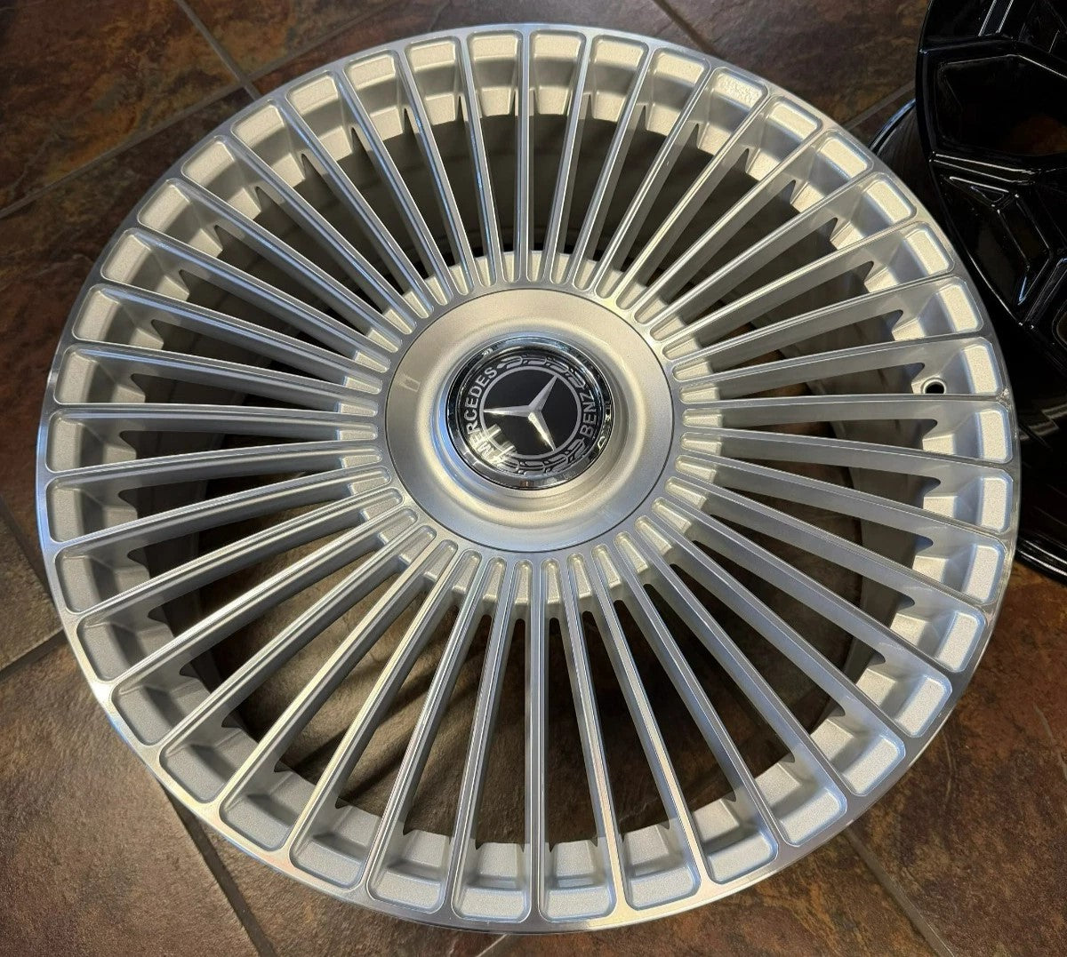 Silver 22-inch OE Style Wheels with multiple spokes for Mercedes CLS, S, GLE, GLS models, featuring a machined finish.