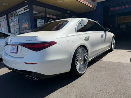 22-inch silver machined Mercedes wheels with multiple spokes, fitting CLS, S, GLE, and GLS models from OE Style Wheels.