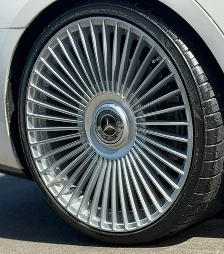 Silver 22-inch OE Style Wheels with multiple spokes for Mercedes CLS, S, GLE, GLS, featuring machined finish and sleek automotive design.
