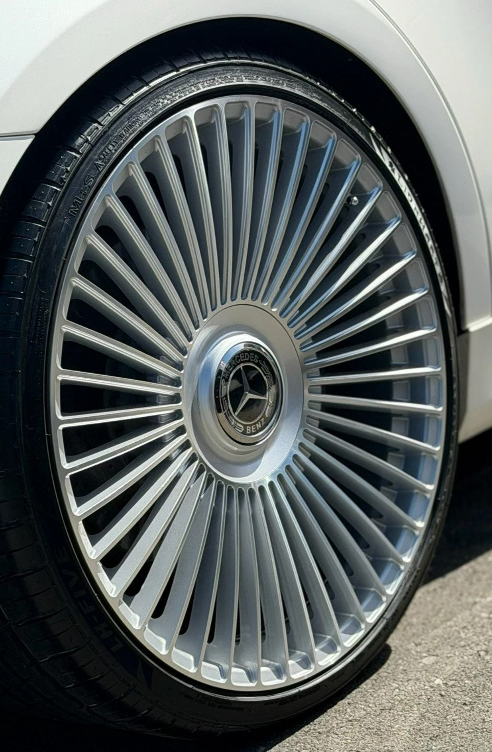 22-inch silver machined Mercedes car wheels with multiple spokes from OE Style Wheels, fitting CLS, S, GLE, and GLS models.