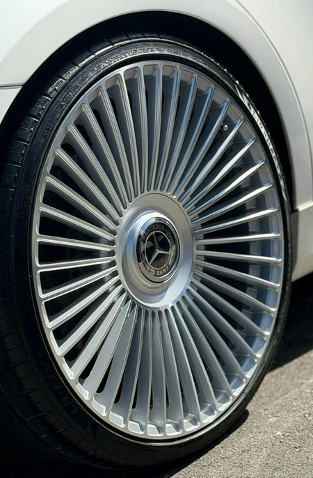 22-inch silver machined Mercedes car wheels with multiple spokes from OE Style Wheels, fitting CLS, S, GLE, and GLS models.