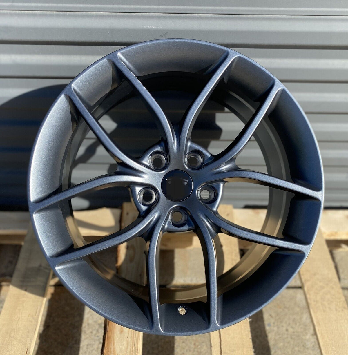 18-inch gunmetal automotive wheels by OE Style Wheels, designed for Tesla Model 3 AWD, RWD, and Long Range Performance vehicles.