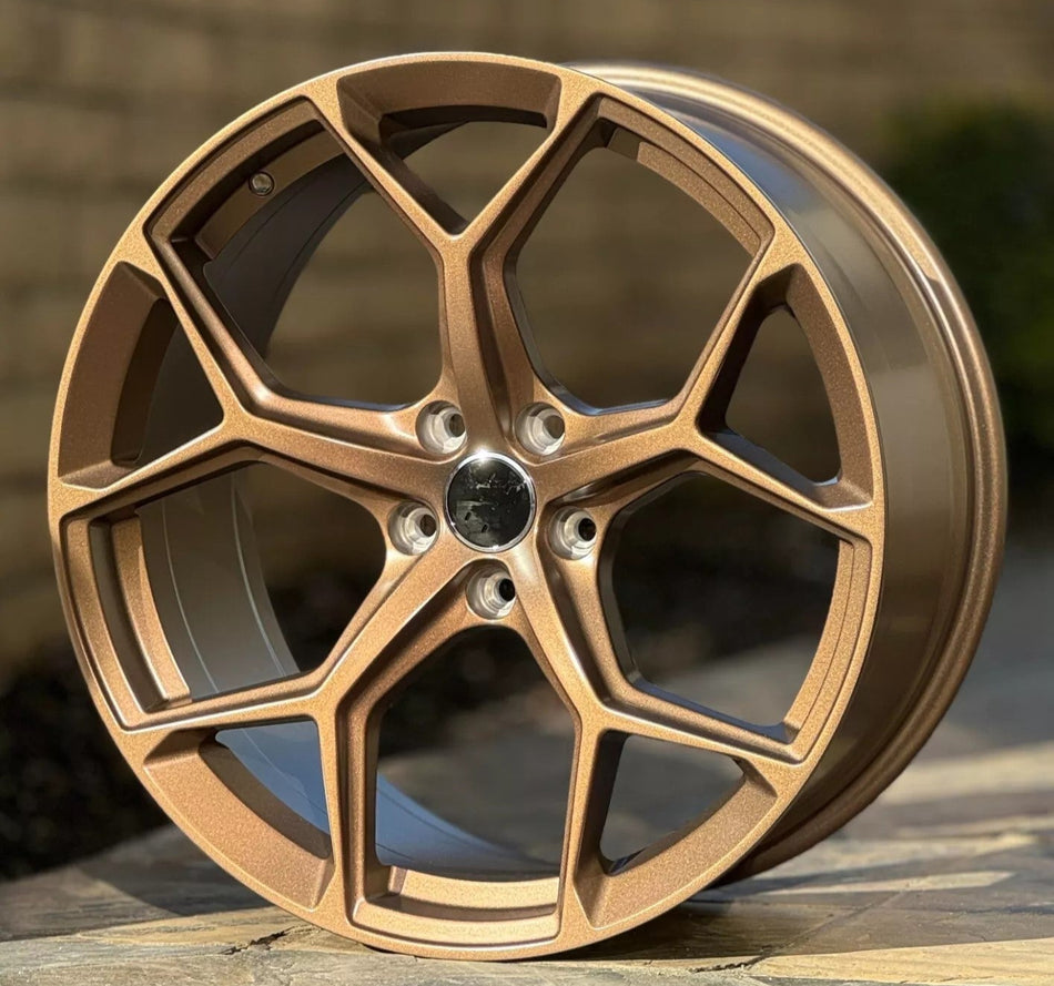 19-inch OE Style Wheels RS6 Performance Bronze rims on an Audi A4, showcasing sporty design and metallic finish.