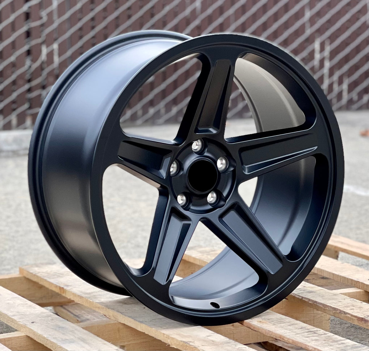 20-inch Demon Style Concave Wheels by OE Style Wheels fitted on Dodge Challenger and Charger models, showcasing sleek automotive rims.