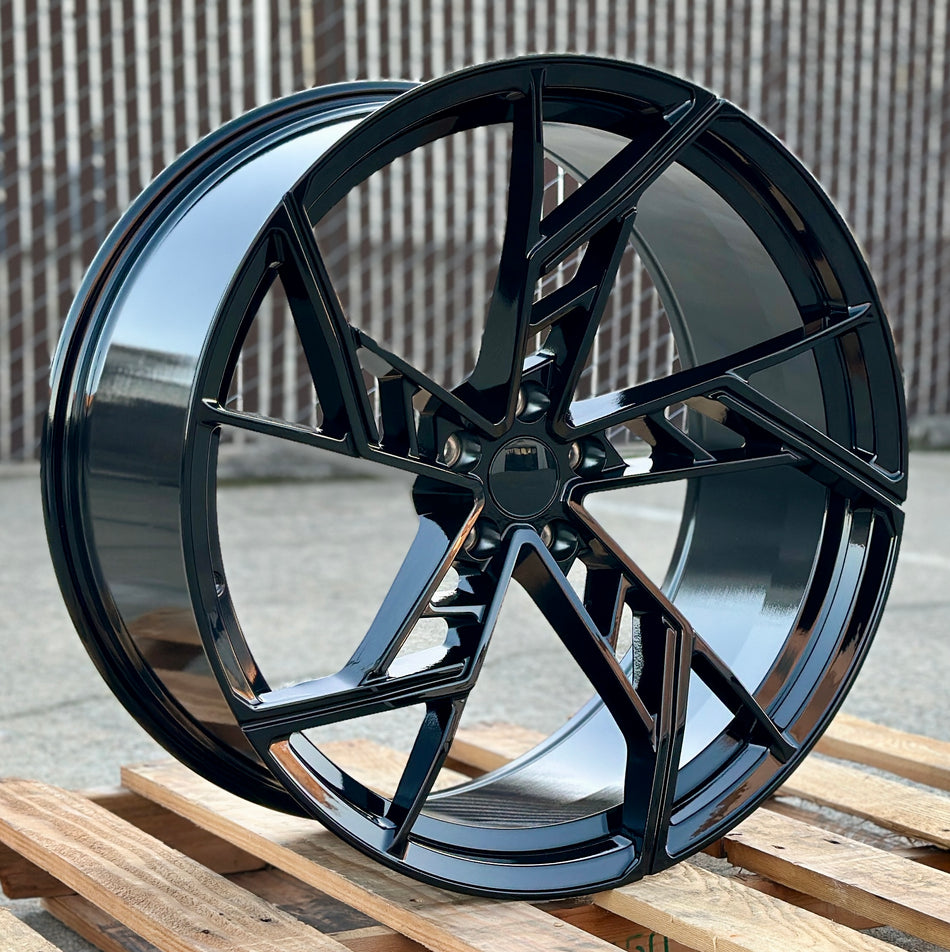 20-inch OE Style Wheels Legacy Edition gloss black rims fitted on an Audi A4, showcasing sleek, modern automotive wheel design.