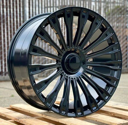22-inch Maybach style gloss black Mercedes wheels by OE Style Wheels, fitting CLS, S, GLE, GLS models, sleek automotive rims.