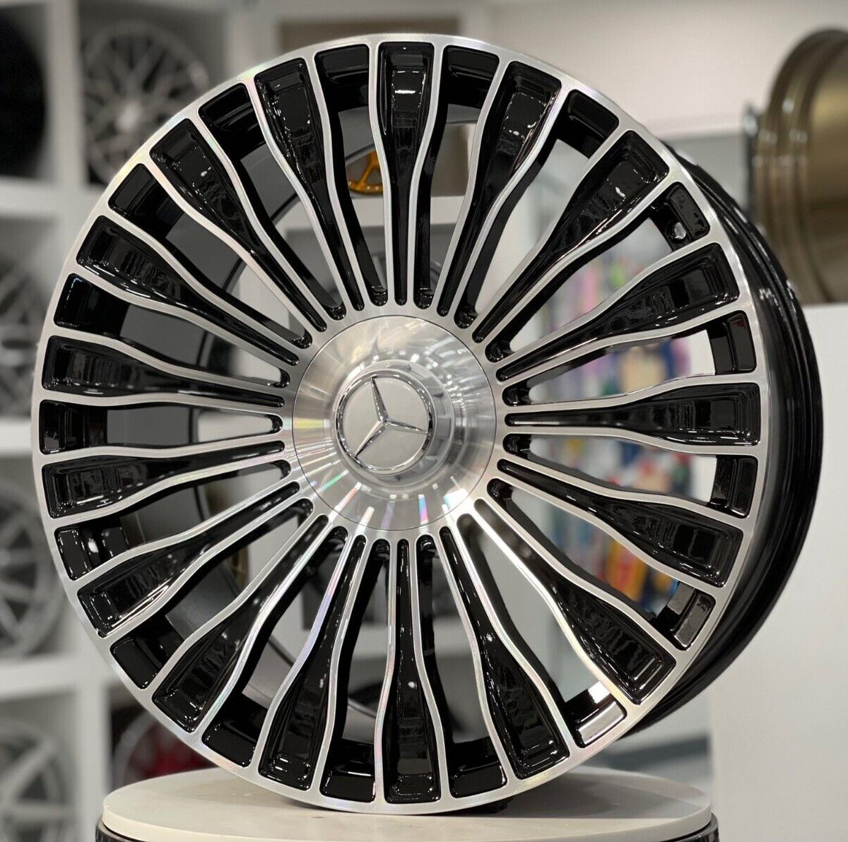 22-inch Maybach style black machined wheels by OE Style Wheels on a Mercedes CLS, S, GLE, GLS, AMG SUV, showing detailed rim design.