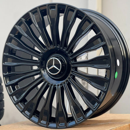 22-inch Maybach style gloss black wheels by OE Style Wheels on Mercedes CLS, S, GLE, and GLS models.