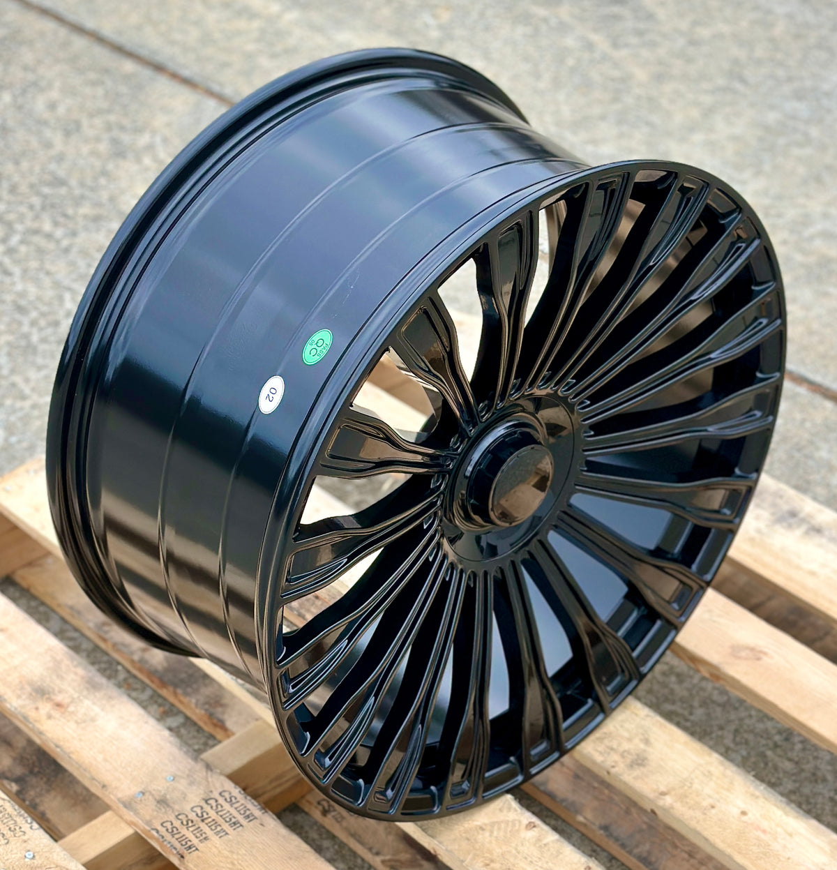 22-inch Maybach style gloss black wheels by OE Style Wheels on Mercedes CLS, S, GLE, GLS vehicles, showcasing sleek automotive rims.