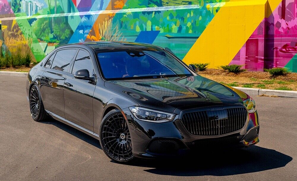 22-inch glossy black mesh wheels by OE Style Wheels for Mercedes CLS, S, GLE, GLS, and AMG models.