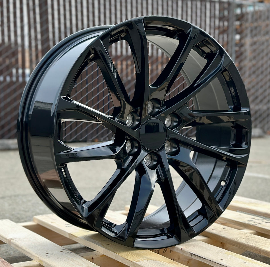 22-inch Sierra style gloss black wheels by OE Style Wheels for Chevy Silverado, Suburban, Tahoe, GMC Sierra, and Yukon vehicles.