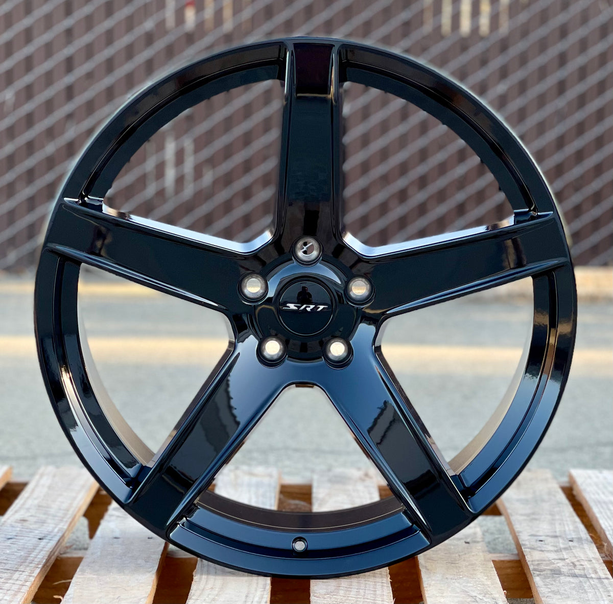 Gloss black 22-inch OE Style Wheels for Dodge Durango and Jeep Grand Cherokee, showcasing the sleek automotive rim design.