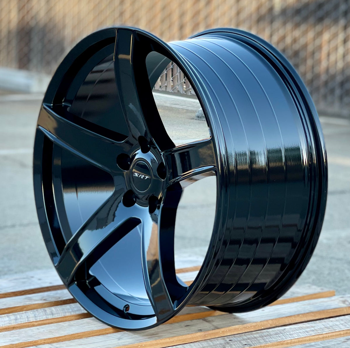 Gloss black 22-inch HC2 style OE Wheels for Dodge Durango and Jeep Grand Cherokee, showcasing sleek automotive rims.