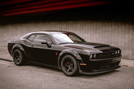 20-inch Demon Style concave wheels by OE Style Wheels on a Dodge Challenger and Charger, showcasing aggressive automotive rims.