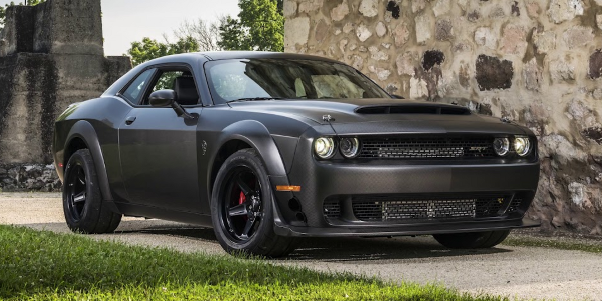 20-inch Demon Style concave wheels from OE Style Wheels fitted on Dodge Challenger and Charger models, showcasing sleek automotive rims.