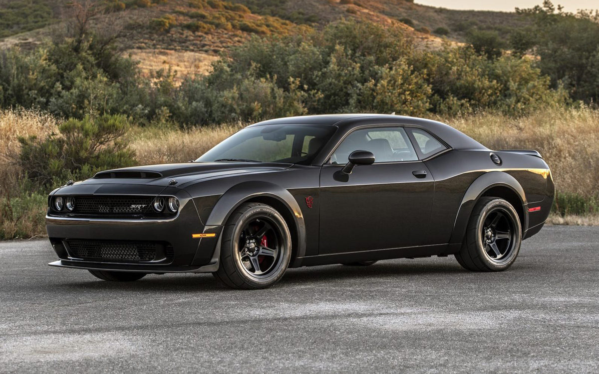 20-inch Demon Style concave wheels by OE Style Wheels fitted on Dodge Challenger and Charger models, showcasing sleek automotive rim design.