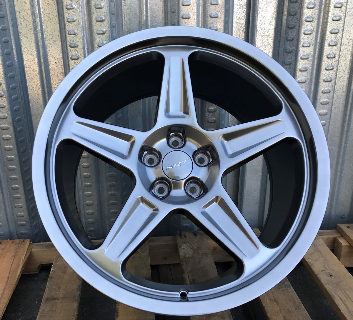 20-inch Demon Style Hyper Black wheels by OE Style Wheels on Dodge Challenger and Charger models, showcasing sleek automotive rims.
