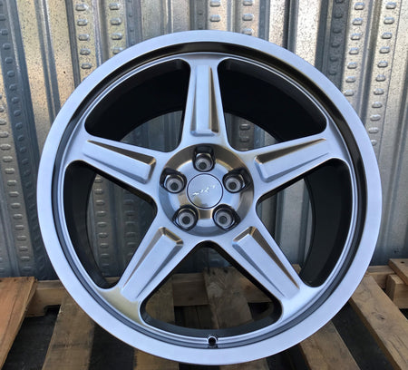 20-inch Demon Style Hyper Black wheels by OE Style Wheels on Dodge Challenger and Charger models, showcasing sleek automotive rims.