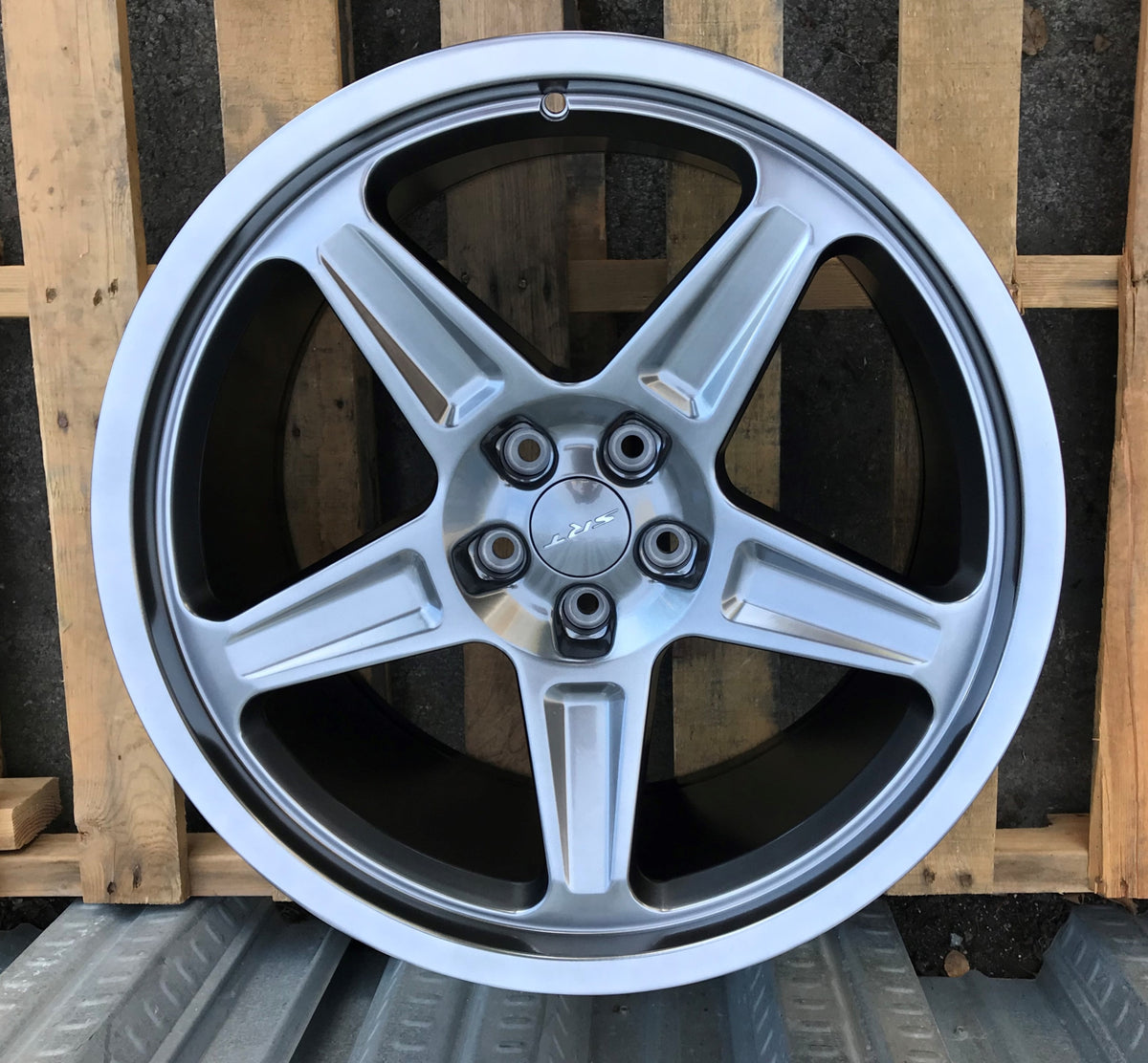 20-inch Demon Style Hyper Black wheels from OE Style Wheels on a Dodge Challenger or Charger, featuring aggressive automotive rims.