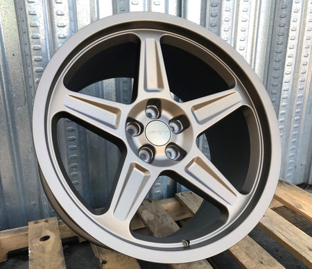 20-inch Demon Style matte bronze wheels by OE Style Wheels installed on a Dodge Challenger and Charger, showcasing aggressive automotive rims.