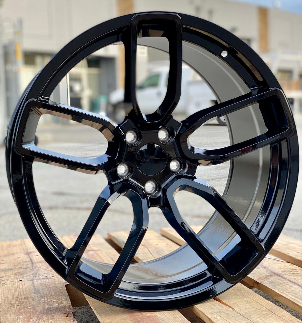 20-inch Hellcat style gloss black wheels by OE Style Wheels on Dodge Challenger and Charger models with sporty design.