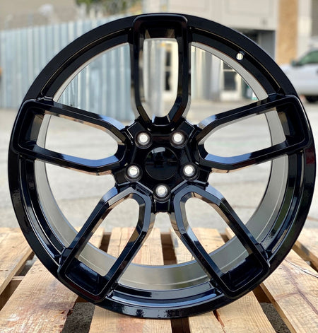 20-inch Hellcat style gloss black wheels by OE Style Wheels on a Dodge Challenger and Charger, showcasing their bold, sleek design.