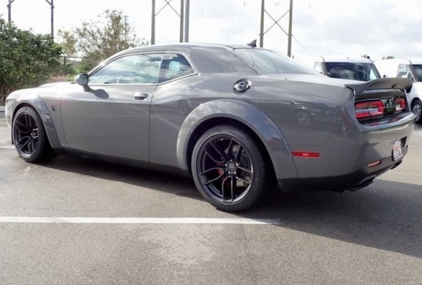 20-inch Hellcat style matte black wheels for Dodge Challenger and Charger by OE Style Wheels, showcasing bold automotive rims.