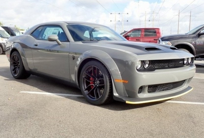 20-inch matte black Hellcat style wheels by OE Style Wheels fitted on Dodge Challenger and Charger models, showcasing aggressive automotive rims.