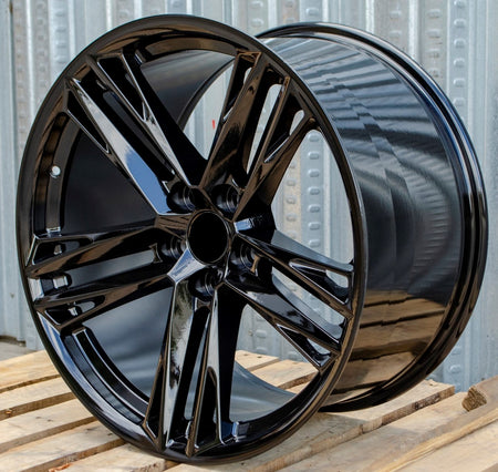 20-inch ZL1 style gloss black wheels for Chevy Camaro ZL1 SS LT by OE Style Wheels, showing sleek automotive rims with a glossy finish.