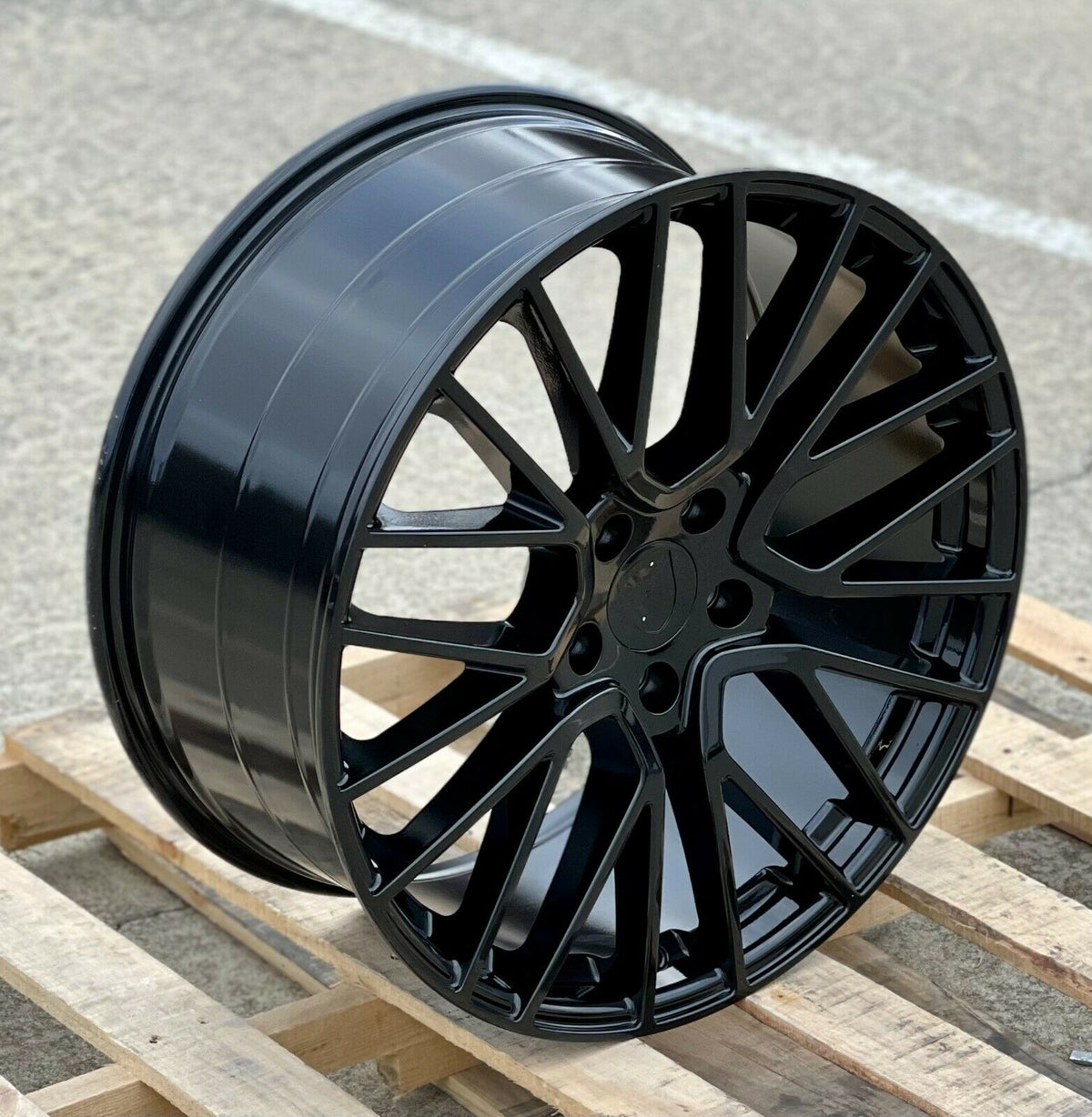 Gloss black 22-inch staggered GTS coupe style wheels by OE Style for Porsche Cayenne GTS, Panamera 4 GTS, and Turbo models.