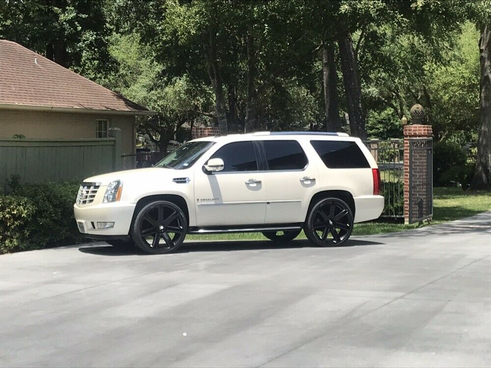 24-inch OE Style Wheels black luxury rims for Cadillac Escalade, premium sport automotive rims with a sleek, stylish design.