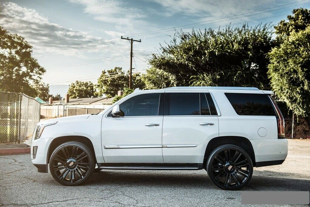 26-inch black diamond style wheels by OE Style Wheels for Cadillac Escalade luxury and sport models, showcasing a sleek, polished finish.