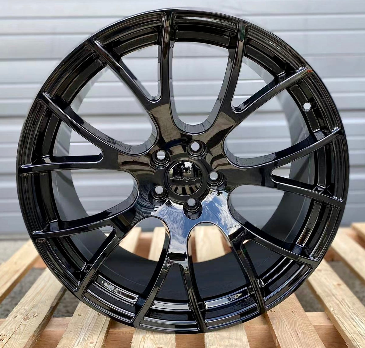 Gloss black 20-inch staggered OE Style Wheels for Dodge Challenger and Charger models, showcasing sleek, high-performance vehicle rims.